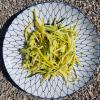 Green zucchini and yellow zucchini spaghetti raw